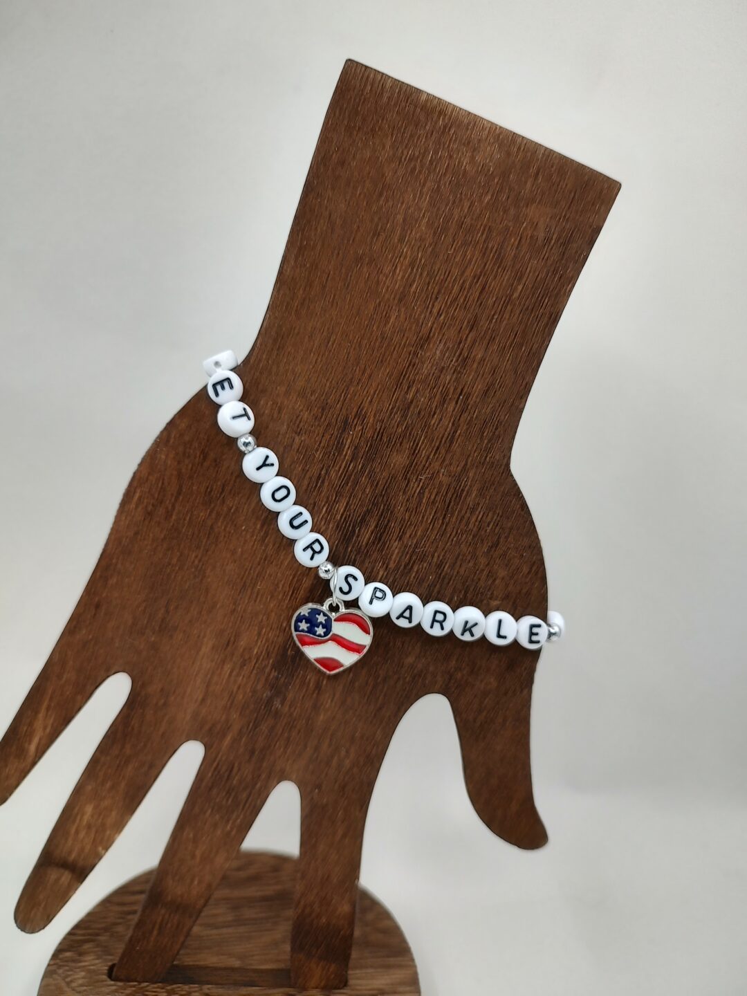 IMG 20240512 150509898 HDR scaled <ul> <li><strong>Patriotic Style</strong>: Elevate your look with our exclusive Everett <span>beaded bracelets</span>, featuring a unique combination of 4x7mm Acrylic Letter Beads, paired with sparkling 6mm crystal beads in red, white, and blue, 13 silver or gold iron spacer beads adds a touch of elegance to any outfit. <span>Add more personality to your outfit and show off your patriotism with these handmade stretch bracelets, ideal for holiday outfits on the 4th of July</span></li> <li><span class="a-list-item a-size-base a-color-base"><strong>Comfortable to Wear</strong>: Our beaded Get Your Sparkle On Everett bracelets are lightweight and strong, comfortable to wear, durable and stretchable, you can wear these patriotic charm bracelets without feeling heavy; stretch bracelets are waterproof, safe and reliable, and can be worn for a long time to add a little color to your life</span><span class="a-list-item a-size-base a-color-base"></span></li> <li><span class="a-list-item a-size-base a-color-base"><strong>Independence Day Theme Design</strong>: this red white blue bracelet is a good way to add a patriotic touch to Independence Day, not only to add to the mood of hosting an American themed party, but also to make a meaningful patriotic gift for loved ones, mothers, sisters, best friends, any American or lover of freedom and independence on Independence Day, Veterans Day, Memorial Day.  </span></li> <li><strong>Handcrafted Quality</strong>: handmade bracelets is meticulously handcrafted with attention to detail, ensuring a one-of-a-kind piece that stands out from the rest. Choose either a Heart, Star, or the year Charm bracelets for women is made of quality crystal glass, sturdy and solid, lightweight but sustained, strong enough against breakage, cracking, or abrasion, serving you for periods of time, so you can use them with confidence.</li> </ul>