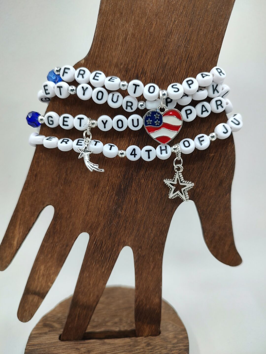 IMG 20240523 155911064 HDR scaled <ul> <li><strong>Stand out with patriotic pride</strong>: Show off your love for the USA with our Custom Snap Crackle Pop Bracelet featuring vibrant red, white, and blue crystal beads. Perfect for celebrating holidays or adding a pop of color to any outfit, this handcrafted bracelet is a stylish symbol of American spirit.</li> <li><strong>Handcrafted precision</strong>: Each cord is meticulously crafted with 4x7mm Acrylic Letter Beads and shimmering crystal beads, creating a unique and eye-catching accessory that is sure to elevate your style. The combination of iron spacer beads adds an extra touch of elegance to these stretch bracelets.</li> <li><strong>Exclusive design</strong>: Make a bold statement with our exclusive Snap Crackle Pop Bracelet, designed to showcase your patriotism in a fashionable way. Whether you choose silver or gold spacer beads, this string bracelet exudes sophistication and charm.</li> <li><strong>Effortless style upgrade</strong>: Elevate your look effortlessly with these bracelets for women that are not just accessories but expressions of pride and individuality. The stretch design ensures a comfortable fit for all wrist sizes, making it easy to wear and pair with any ensemble.</li> <li><strong>Versatile fashion accessory</strong>: From casual outings to special occasions, these custom bracelets are versatile enough to complement a wide range of outfits. Add a touch of sparkle and personality to your wardrobe while proudly displaying your love for the USA.</li> </ul>